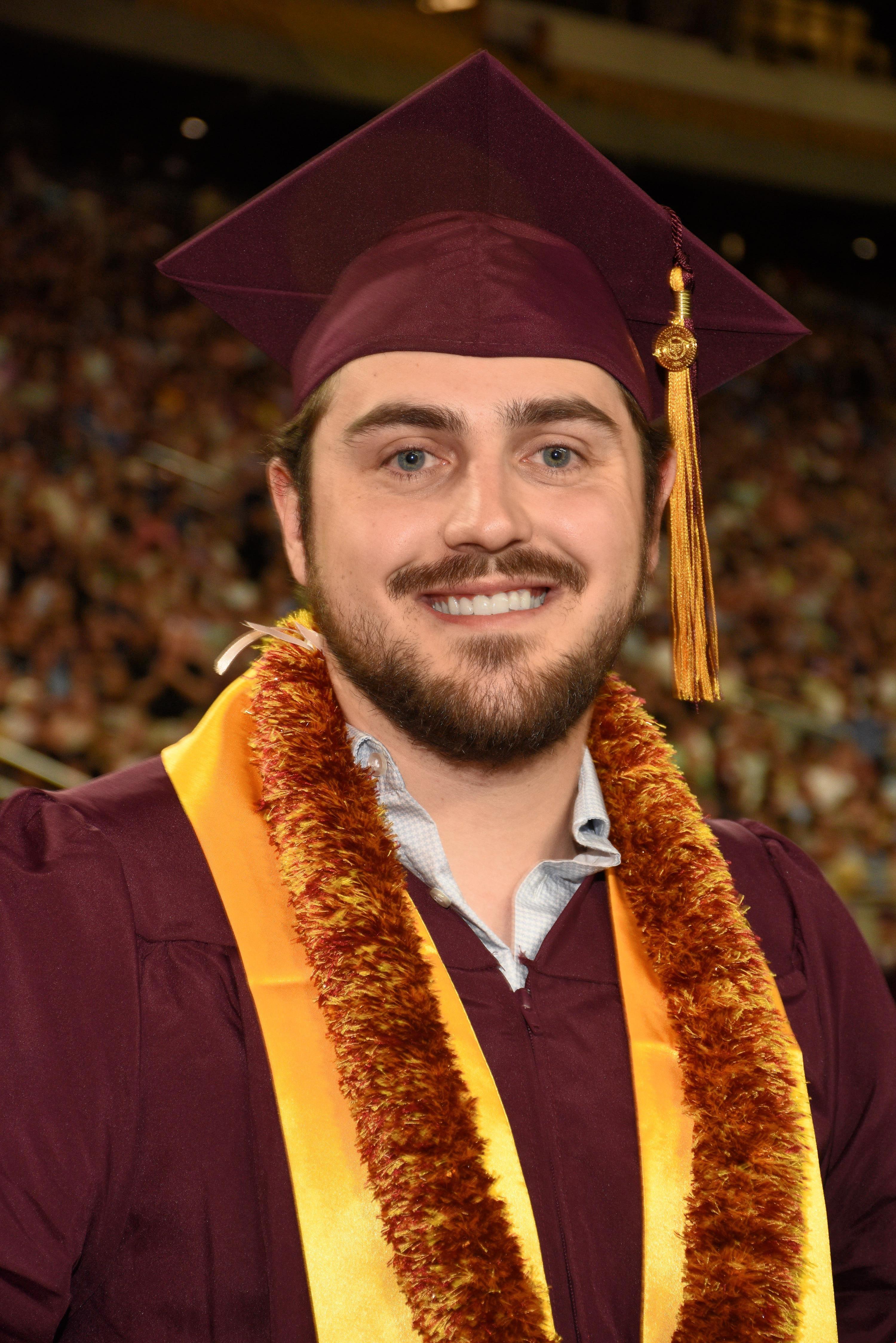 Bo Hubbard in a graduation cap and gown